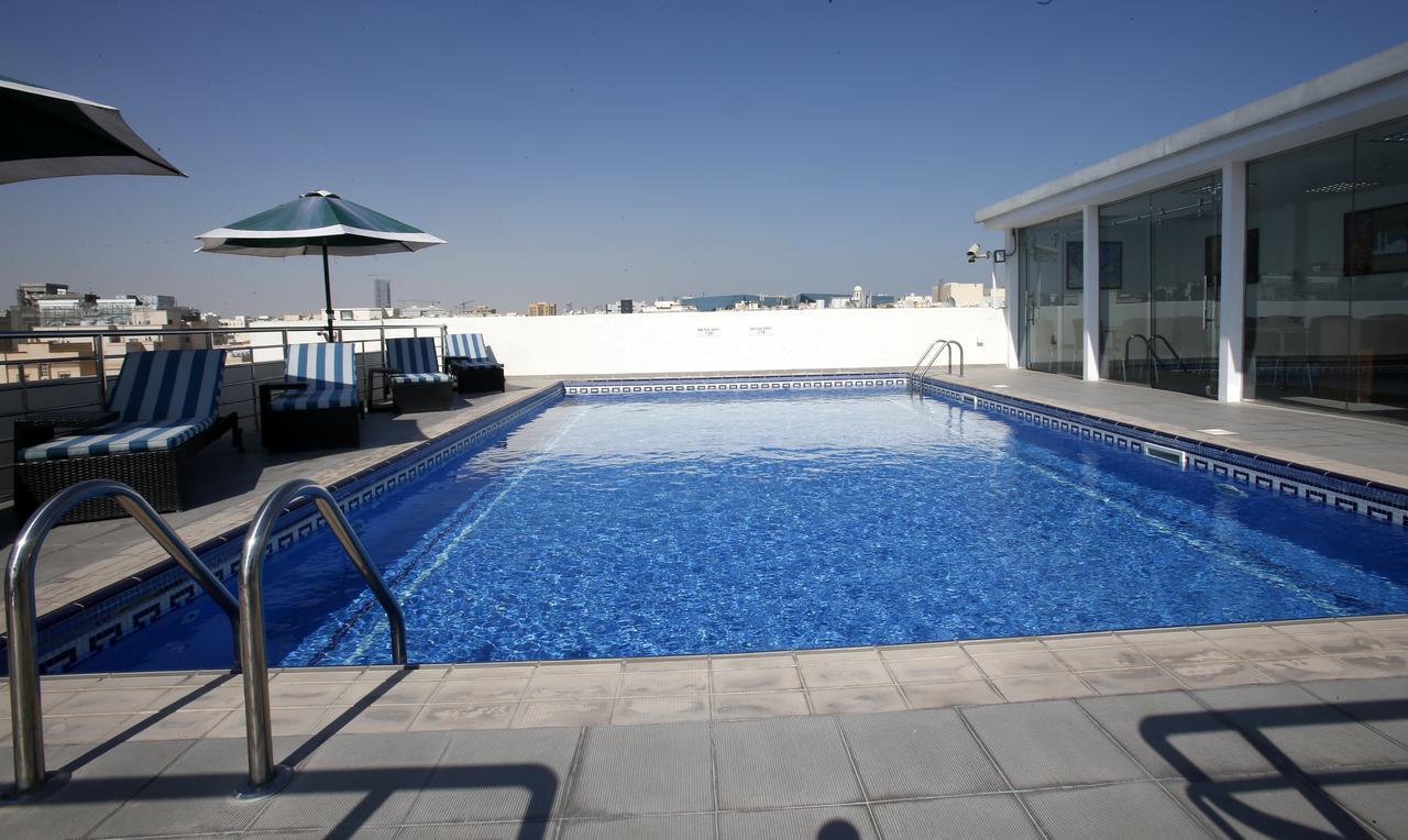 Rawda Hotel Doha Bagian luar foto