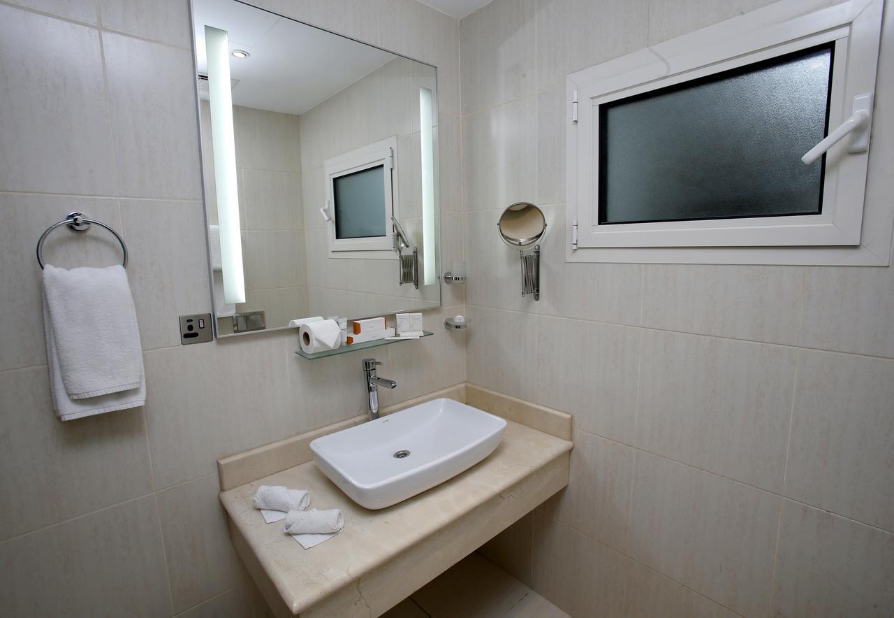 Rawda Hotel Doha Bagian luar foto