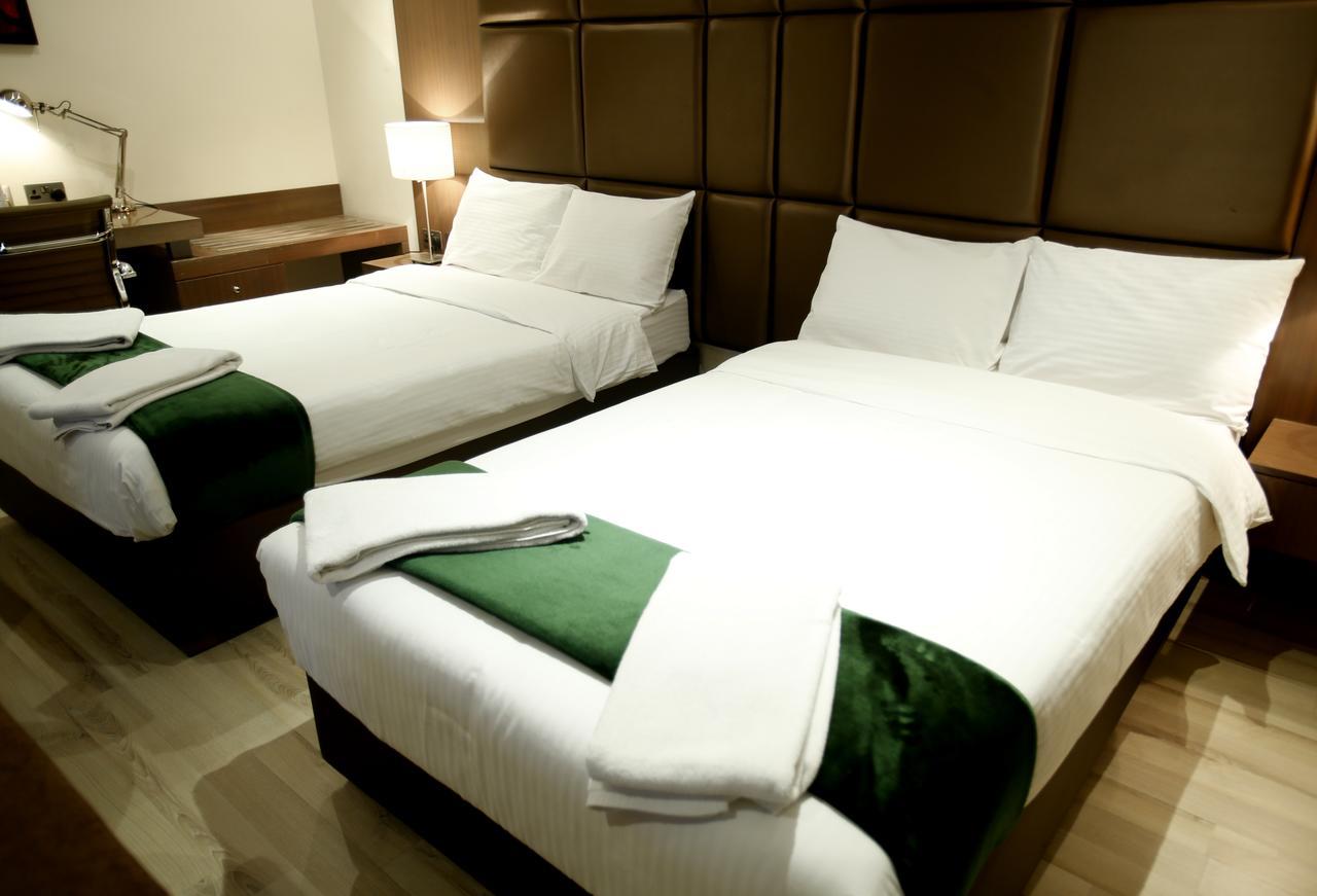 Rawda Hotel Doha Bagian luar foto
