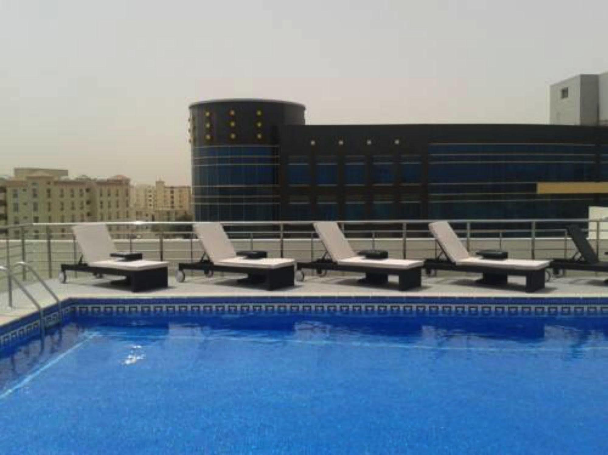 Rawda Hotel Doha Bagian luar foto